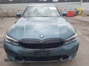 ✅ 2021 BMW 3 Series 330i • VIN: 3MW5R1J06M8B58481 • Lot: 43752256. Listed on IAAI with 15,446 mi. Free auction sales archive from the USA and detailed vehicle history report at DreamBid. Image 12.