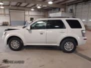 ✅ 2010 Mercury Mariner Premier • VIN: 4M2CN8HGXAKJ00279 • Lot: 41748487. Listed on IAAI with 116,565 mi. Free auction sales archive from the USA and detailed vehicle history report at DreamBid. Image 14.