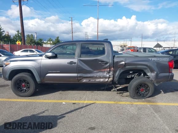 ✅ 2017 Toyota Tacoma TRD Pro • VIN: 5TFCZ5AN6HX071281 • Lot: 43720789. Listed on IAAI with 202,716 mi. Free auction sales archive from the USA and detailed vehicle history report at DreamBid. Image 14.