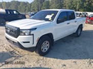 ✅ 2022 Nissan Frontier SV • VIN: 1N6ED1EJXNN634098 • Lot: 43128614. Wystawiony na IAAI z przebiegiem 77 929 mil. Bezpłatny archiwum sprzedaży aukcyjnych z USA i szczegółowy raport historii pojazdu na DreamBid. Zdjęcie 2.