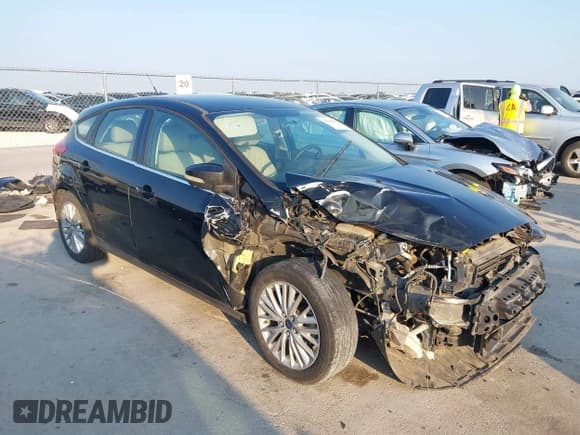 ✅ 2016 Ford Focus Titanium • VIN: 1FADP3N23GL339780 • Lot: 43192984. Listed on IAAI with 136,068 mi. Free auction sales archive from the USA and detailed vehicle history report at DreamBid. Image 1.