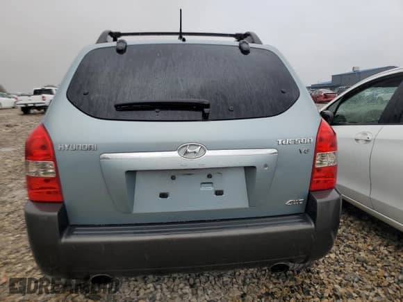 2005 Hyundai Tucson GLS z VIN KM8JN72DX5U214908, wystawiony jako Copart lot #76346024 z przebiegiem 152 677 mil mil oraz Szkoda całkowita • Salvage title. Historia ofert i sprzedaży dostępna na DreamBid. Obrazek 6.