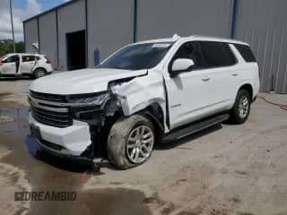 2021 Chevrolet Tahoe LT с VIN 1GNSCNKDXMR370619, выставлен на аукционе Copart как лот 54683085 с пробегом 90 950 миль миль и Списание • Salvage title. История ставок и продаж доступна на DreamBid. Изображение 1.