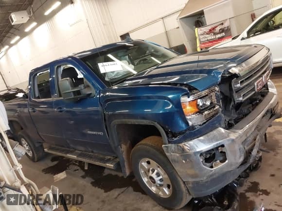 ✅ 2015 GMC Sierra 2500HD SLE • VIN: 1GT12YEG2FF621989 • Lot: 41643601. Listed on IAAI with 207,556 mi. Free auction sales archive from the USA and detailed vehicle history report at DreamBid. Image 13.