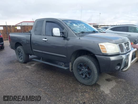 ✅ 2005 Nissan Titan XE • VIN: 1N6AA06B45N516900 • Lot: 43763454. Listed on IAAI with 216,705 mi. Free auction sales archive from the USA and detailed vehicle history report at DreamBid. Image 1.