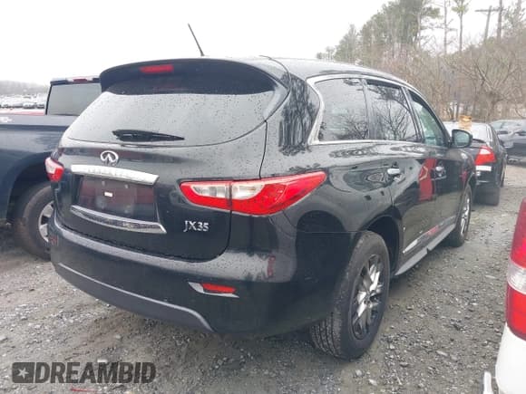 ✅ 2013 Infiniti JX35 • VIN: 5N1AL0MN5DC322585 • Lot: 41573853. Listed on IAAI with 176,136 mi. Free auction sales archive from the USA and detailed vehicle history report at DreamBid. Image 4.
