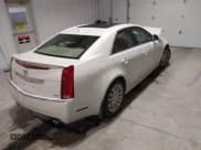 ✅ 2010 Cadillac CTS • VIN: 1G6DM5EV1A0116027 • Lot: 43794597. Listed on IAAI with 79,374 mi. Free auction sales archive from the USA and detailed vehicle history report at DreamBid. Image 4.