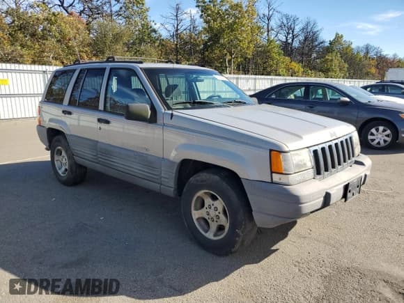 ✅ 1998 Jeep Grand Cherokee Laredo • VIN: 1J4GZ58S1WC195986 • Лот: 87188215. Опубликован ранее на Copart с пробегом 151 052 миль. Бесплатный доступ к архиву аукционных продаж из США и подробный отчёт об истории автомобиля на DreamBid. Изображение 4.