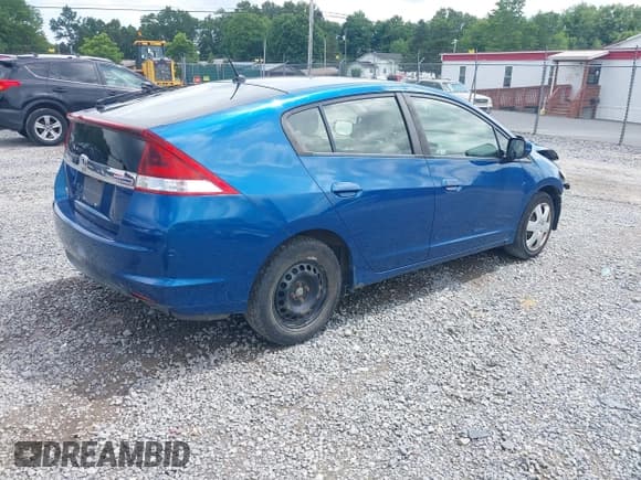 ✅ 2013 Honda Insight • VIN: JHMZE2H30DS002407 • Лот: 42690760. Опубликован ранее на IAAI с пробегом 118 203 миль. Бесплатный доступ к архиву аукционных продаж из США и подробный отчёт об истории автомобиля на DreamBid. Изображение 4.