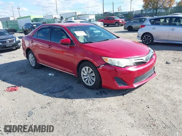✅ 2014 Toyota Camry LE • VIN: 4T4BF1FK1ER375628 • Lot: 43516489. Listed on IAAI with 129,365 mi. Free auction sales archive from the USA and detailed vehicle history report at DreamBid. Image 1.