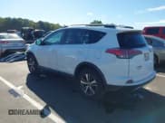 ✅ 2018 Toyota RAV4 XLE • VIN: 2T3WFREV7JW496154 • Lot: 43380383. Listed on IAAI with 216,596 mi. Free auction sales archive from the USA and detailed vehicle history report at DreamBid. Image 3.