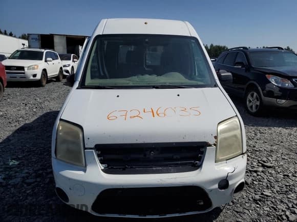 ✅ 2012 Ford Transit Connect XLT • VIN: NM0LS7DN7CT077499 • Lot: 67246035. Listed on Copart with 239,571 mi. Free auction sales archive from the USA and detailed vehicle history report at DreamBid. Image 5.