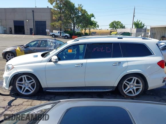 ✅ 2013 Mercedes-Benz GL 550 • VIN: 4JGDF7DE8DA239936 • Lot: 42703205. Listed on IAAI with 149,286 mi. Free auction sales archive from the USA and detailed vehicle history report at DreamBid. Image 14.