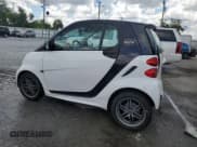 ✅ 2015 Smart fortwo Passion • VIN: WMEEJ3BA5FK811009 • Лот: 69101625. Опубликован ранее на Copart с пробегом 96 685 миль. Бесплатный доступ к архиву аукционных продаж из США и подробный отчёт об истории автомобиля на DreamBid. Изображение 2.