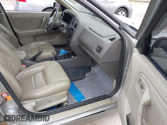 ✅ 1999 Infiniti G20 • VIN: JNKCP11A8XT019604 • Lot: 42828049. Wystawiony na IAAI z przebiegiem 159 867 mil. Bezpłatny archiwum sprzedaży aukcyjnych z USA i szczegółowy raport historii pojazdu na DreamBid. Zdjęcie 5.