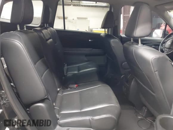 ✅ 2016 Honda Pilot Touring • VIN: 5FNYF5H91GB006631 • Lot: 43566110. Listed on IAAI with 144,494 mi. Free auction sales archive from the USA and detailed vehicle history report at DreamBid. Image 8.