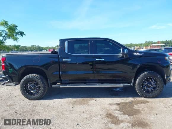 2019 Chevrolet Silverado 1500 High Country с VIN 1GCUYHED5KZ231124, выставлен на аукционе IAAI как лот 42491086 с пробегом 96 124 миль миль и . История ставок и продаж доступна на DreamBid. Изображение 13.