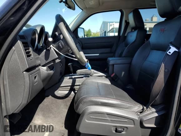 2007 Dodge Nitro R/T z VIN 1D8GT58677W627976, wystawiony jako Copart lot #70620994 z przebiegiem 146 750 mil mil oraz Szkoda całkowita • Salvage title. Historia ofert i sprzedaży dostępna na DreamBid. Obrazek 7.