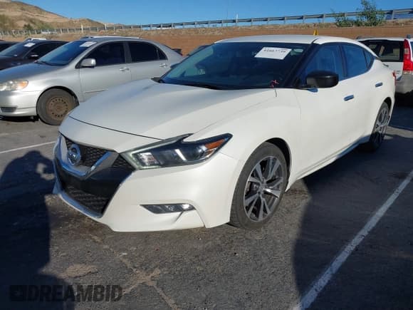 ✅ 2016 Nissan Maxima Platinum • VIN: 1N4AA6AP2GC409454 • Lot: 41667739. Listed on IAAI with 91,132 mi. Free auction sales archive from the USA and detailed vehicle history report at DreamBid. Image 2.