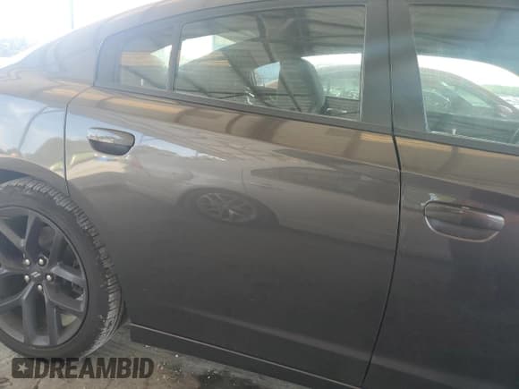 ✅ 2023 Dodge Charger SXT • VIN: 2C3CDXBG3PH518943 • Lot: 70438985. Listed on Copart with 85,749 mi. Free auction sales archive from the USA and detailed vehicle history report at DreamBid. Image 10.