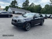 ✅ 2022 BMW X4 M40i • VIN: 5UX43DT01N9J61857 • Lot: 66967615. Listed on Copart with 106,024 mi. Free auction sales archive from the USA and detailed vehicle history report at DreamBid. Image 1.
