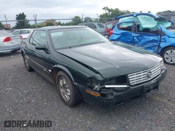 ✅ 2001 Cadillac Eldorado ESC • VIN: 1G6EL12Y01B107760 • Lot: 42797121. Wystawiony na IAAI z przebiegiem 86 446 mil. Bezpłatny archiwum sprzedaży aukcyjnych z USA i szczegółowy raport historii pojazdu na DreamBid. Zdjęcie 6.