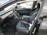 ✅ 2023 Tesla Model Y • VIN: 7SAYGDED1PF941165 • Lot: 71301845. Listed on Copart with 18,142 mi. Free auction sales archive from the USA and detailed vehicle history report at DreamBid. Image 7.