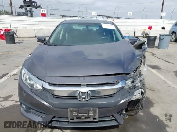 ✅ 2018 Honda Civic EX-T • VIN: JHMFC1F38JX020125 • Lot: 42342438. Listed on IAAI with 115,037 mi. Free auction sales archive from the USA and detailed vehicle history report at DreamBid. Image 13.