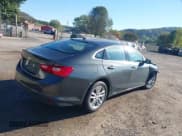 ✅ 2018 Chevrolet Malibu LT • VIN: 1G1ZD5ST7JF170332 • Lot: 43427631. Listed on IAAI with 156,658 mi. Free auction sales archive from the USA and detailed vehicle history report at DreamBid. Image 4.