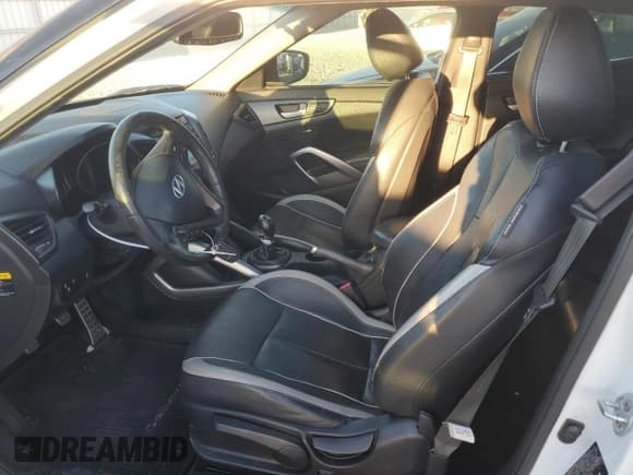 ✅ 2013 Hyundai Veloster Turbo • VIN: KMHTC6AE8DU114856 • Lot: 72818154. Wystawiony na Copart z przebiegiem 107 702 mil. Bezpłatny archiwum sprzedaży aukcyjnych z USA i szczegółowy raport historii pojazdu na DreamBid. Zdjęcie 7.