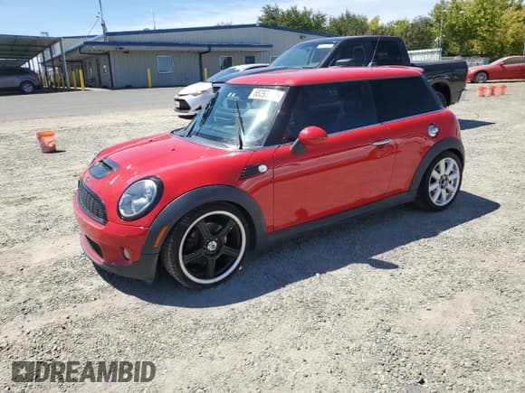 ✅ 2007 MINI Hardtop S • VIN: WMWMF73517TT83310 • Lot: 68293665. Listed on Copart with 121,352 mi. Free auction sales archive from the USA and detailed vehicle history report at DreamBid. Image 1.