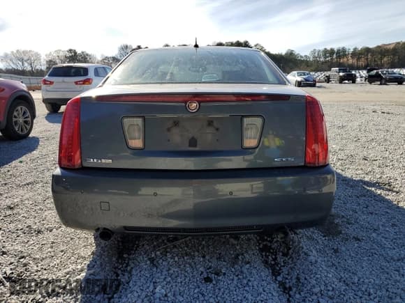 ✅ 2008 Cadillac STS RWD • VIN: 1G6DW67VX80172037 • Лот: 41622065. Опубликован ранее на Copart с пробегом 125 055 миль. Бесплатный доступ к архиву аукционных продаж из США и подробный отчёт об истории автомобиля на DreamBid. Изображение 6.