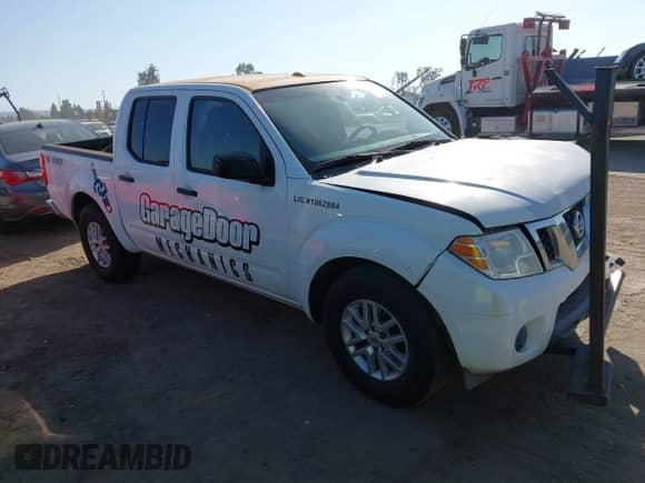 2014 Nissan Frontier Desert Runner z VIN 1N6AD0ER9EN763755, wystawiony jako IAAI lot #43352830 z przebiegiem 221 936 mil mil oraz . Historia ofert i sprzedaży dostępna na DreamBid. Obrazek 1.