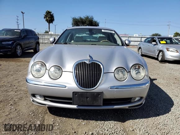 ✅ 2003 Jaguar S-Type • VIN: SAJEA01T33FM59487 • Лот: 80666965. Опубликован ранее на Copart с пробегом 59 700 миль. Бесплатный доступ к архиву аукционных продаж из США и подробный отчёт об истории автомобиля на DreamBid. Изображение 5.