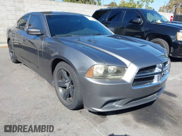 2012 Dodge Charger SE with VIN 2C3CDXBG2CH190201, listed as a IAAI auction lot 43411748 with 198,098 mi miles and . Bid and sale history available at DreamBid. Image 1.