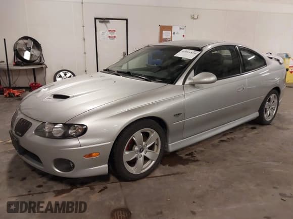 ✅ 2005 Pontiac GTO • VIN: 6G2VX12U55L367948 • Lot: 43061820. Listed on IAAI with 59,308 mi. Free auction sales archive from the USA and detailed vehicle history report at DreamBid. Image 2.