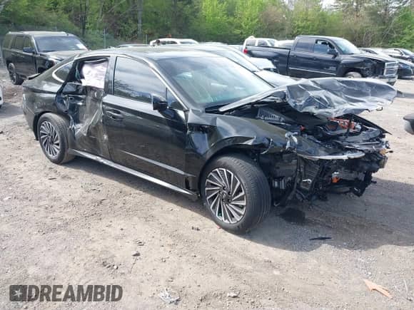 2024 Hyundai Sonata SEL z VIN KMHL34JJ4RA099606, wystawiony jako IAAI lot #41860308 z przebiegiem 3 190 mil mil oraz . Historia ofert i sprzedaży dostępna na DreamBid. Obrazek 1.