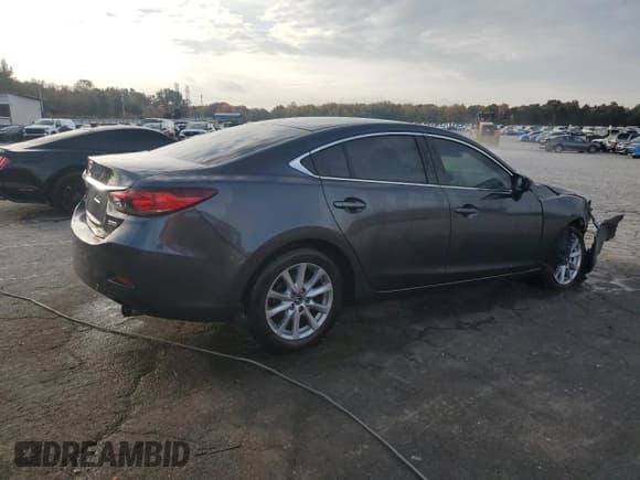 ✅ 2016 Mazda 6 i Sport • VIN: JM1GJ1U56G1431700 • Лот: 90864615. Опубликован ранее на Copart с пробегом 185 855 миль. Бесплатный доступ к архиву аукционных продаж из США и подробный отчёт об истории автомобиля на DreamBid. Изображение 3.