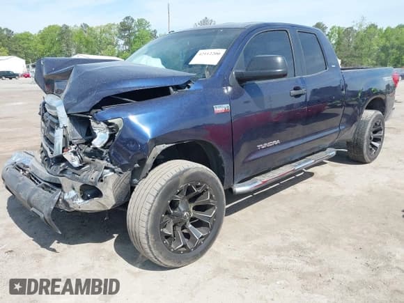 ✅ 2010 Toyota Tundra • VIN: 5TFRY5F18AX086292 • Lot: 42112200. Listed on IAAI with 306,701 mi. Free auction sales archive from the USA and detailed vehicle history report at DreamBid. Image 2.
