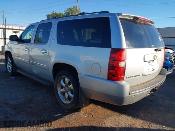 ✅ 2011 Chevrolet Suburban LTZ • VIN: 1GNSKKE33BR256012 • Lot: 43594284. Listed on IAAI with 241,540 mi. Free auction sales archive from the USA and detailed vehicle history report at DreamBid. Image 3.