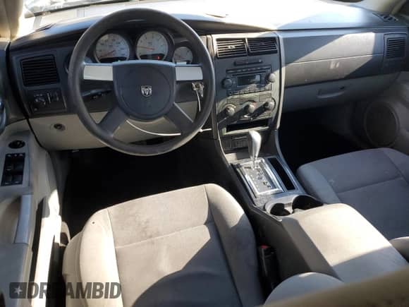 2007 Dodge Charger z VIN 2B3KA43RX7H621552, wystawiony jako Copart lot #86513765 z przebiegiem 154 731 mil mil oraz Szkoda całkowita • Salvage title. Historia ofert i sprzedaży dostępna na DreamBid. Obrazek 8.