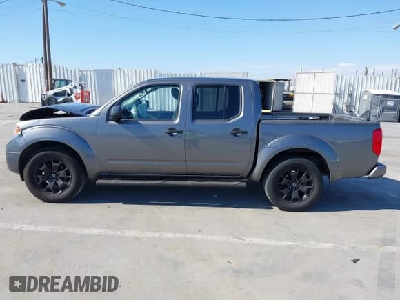 ✅ 2021 Nissan Frontier SV • VIN: 1N6ED0EA7MN706206 • Lot: 43094070. Listed on IAAI with 90,051 mi. Free auction sales archive from the USA and detailed vehicle history report at DreamBid. Image 14.