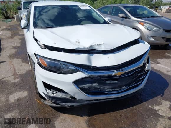 2019 Chevrolet Malibu LS z VIN 1G1ZC5ST7KF114959, wystawiony jako IAAI lot #42392030 z przebiegiem 121 502 mil mil oraz . Historia ofert i sprzedaży dostępna na DreamBid. Obrazek 6.