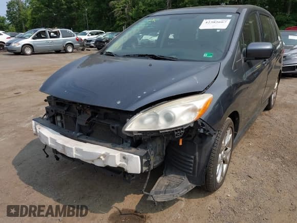 ✅ 2012 Mazda 5 Touring • VIN: JM1CW2CL5C0126744 • Lot: 42385667. Listed on IAAI with 140,150 mi. Free auction sales archive from the USA and detailed vehicle history report at DreamBid. Image 6.