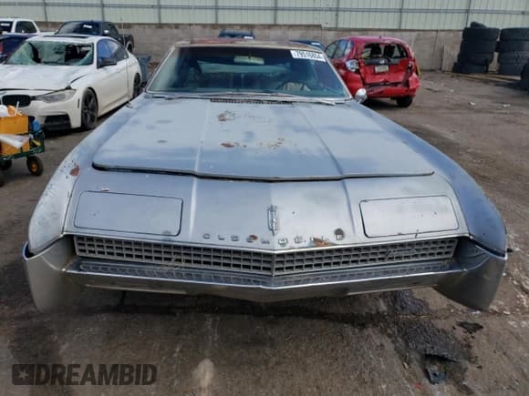 ✅ 1967 Oldsmobile Toronado • VIN: 396877N610043 • Лот: 79516854. Опубликован ранее на Copart с пробегом 242 595 миль. Бесплатный доступ к архиву аукционных продаж из США и подробный отчёт об истории автомобиля на DreamBid. Изображение 5.