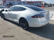 ✅ 2013 Tesla Model S Performance • VIN: 5YJSA1DP2DFP07627 • Lot: 42984853. Listed on IAAI with 198,551 mi. Free auction sales archive from the USA and detailed vehicle history report at DreamBid. Image 3.
