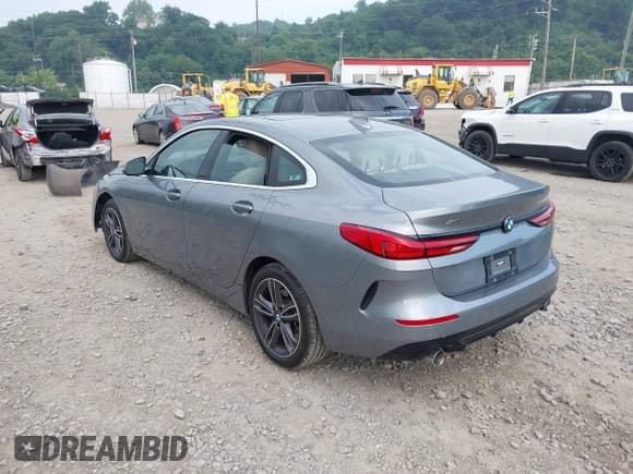 ✅ 2023 BMW 2 Series 228i xDrive • VIN: WBA73AK01P7L83874 • Lot: 42705294. Listed on IAAI with 7,448 mi. Free auction sales archive from the USA and detailed vehicle history report at DreamBid. Image 3.