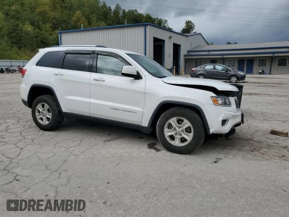 ✅ 2016 Jeep Grand Cherokee Laredo • VIN: 1C4RJFAG0GC496123 • Lot: 81821735. Listed on Copart with 71,714 mi. Free auction sales archive from the USA and detailed vehicle history report at DreamBid. Image 4.