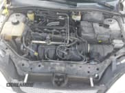 ✅ 2006 Ford Focus S • VIN: 1FAFP34NX6W131980 • Lot: 42408699. Wystawiony na IAAI z przebiegiem 139 258 mil. Bezpłatny archiwum sprzedaży aukcyjnych z USA i szczegółowy raport historii pojazdu na DreamBid. Zdjęcie 10.