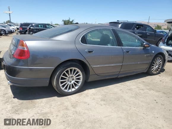 ✅ 2004 Chrysler 300M M • VIN: 2C3AE76K74H680539 • Lot: 59333845. Listed on Copart with 101,090 mi. Free auction sales archive from the USA and detailed vehicle history report at DreamBid. Image 3.